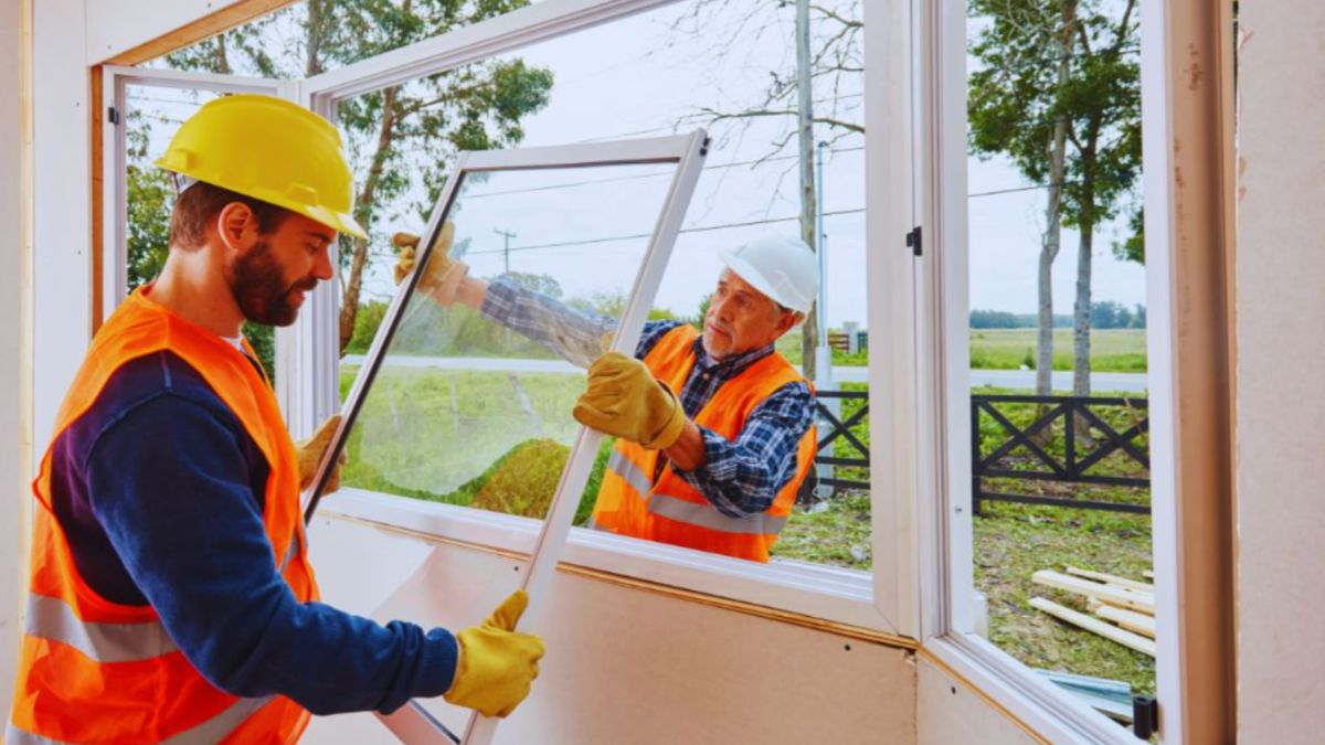 A picture window framing a peaceful view of trees outside